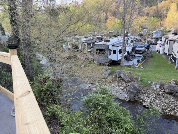 Creekside lot by fence with view overlooking creek and resort Outdoor Resorts at Gatlinburg