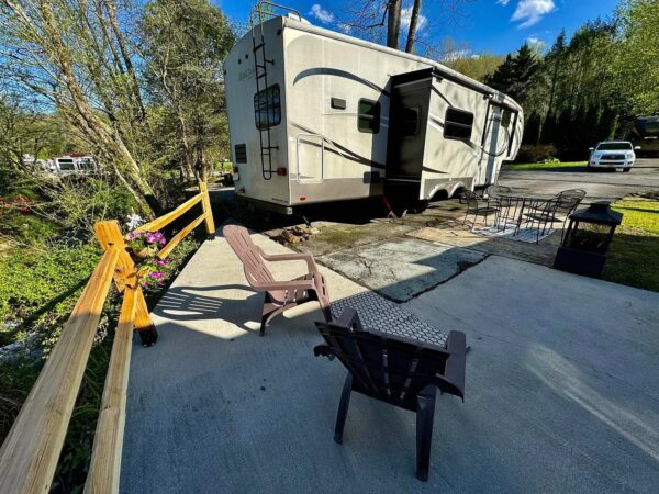 Creekside site patio and parking area