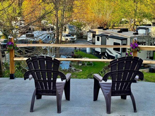 Creekside site patio overlooking Webb Creek and the resort